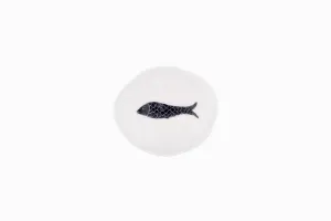 Tiny porcelain dish with black fish